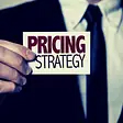 Man holding a sign saying "Pricing Strategy"